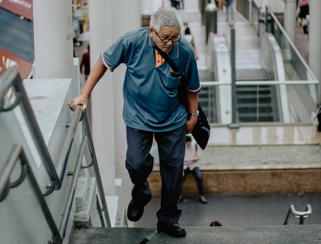 man wearing blue polo shirt