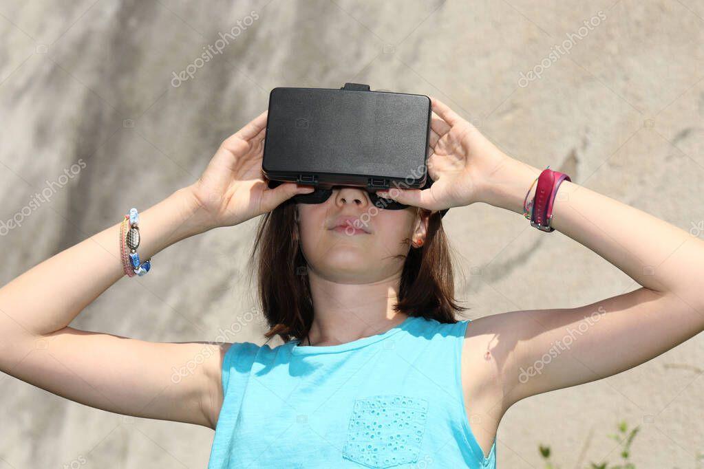 young girl with virtual reality headset during a test